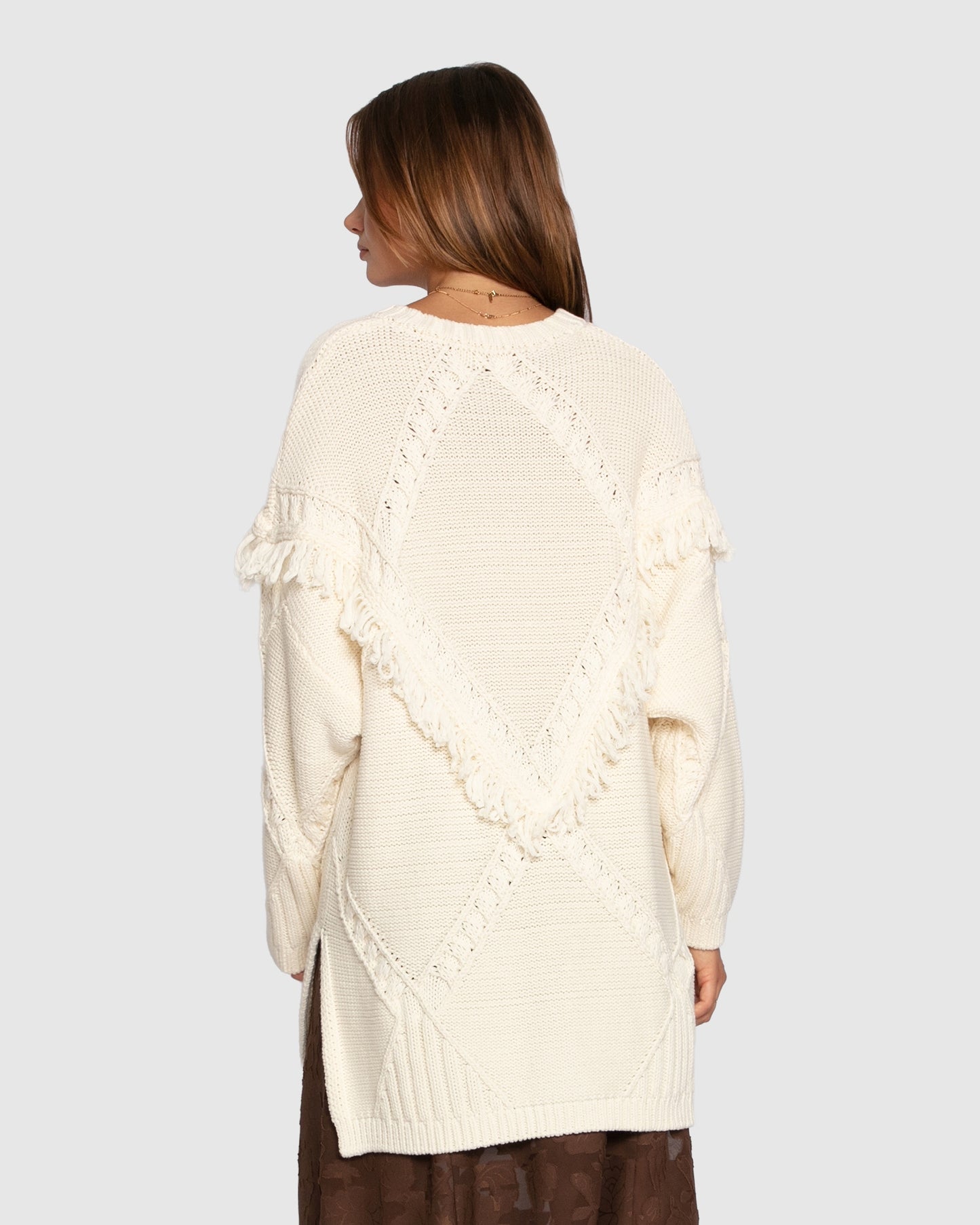 Oversized knit sweater back view cream
