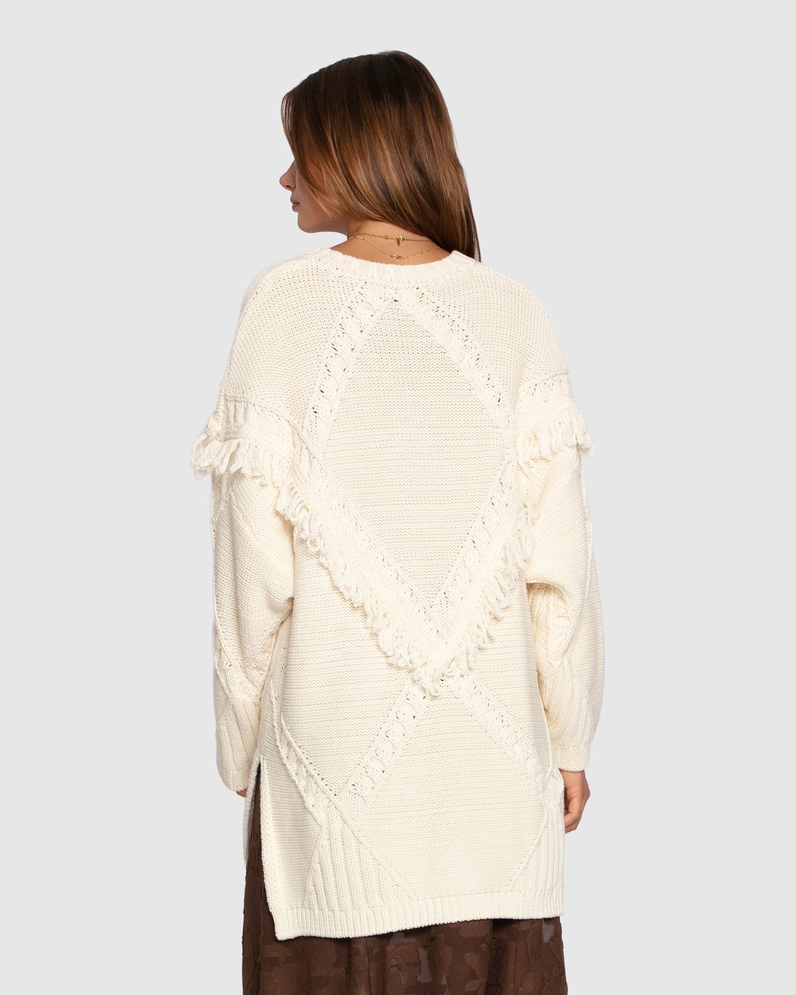 Oversized knit sweater back view cream
