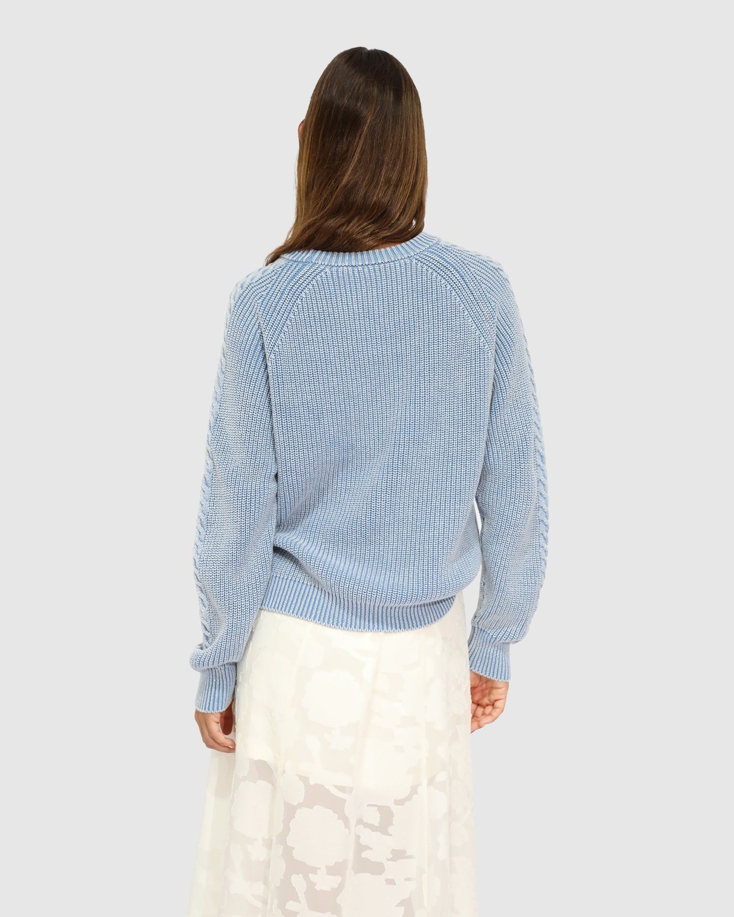 Cable knit sweater back view light blue
