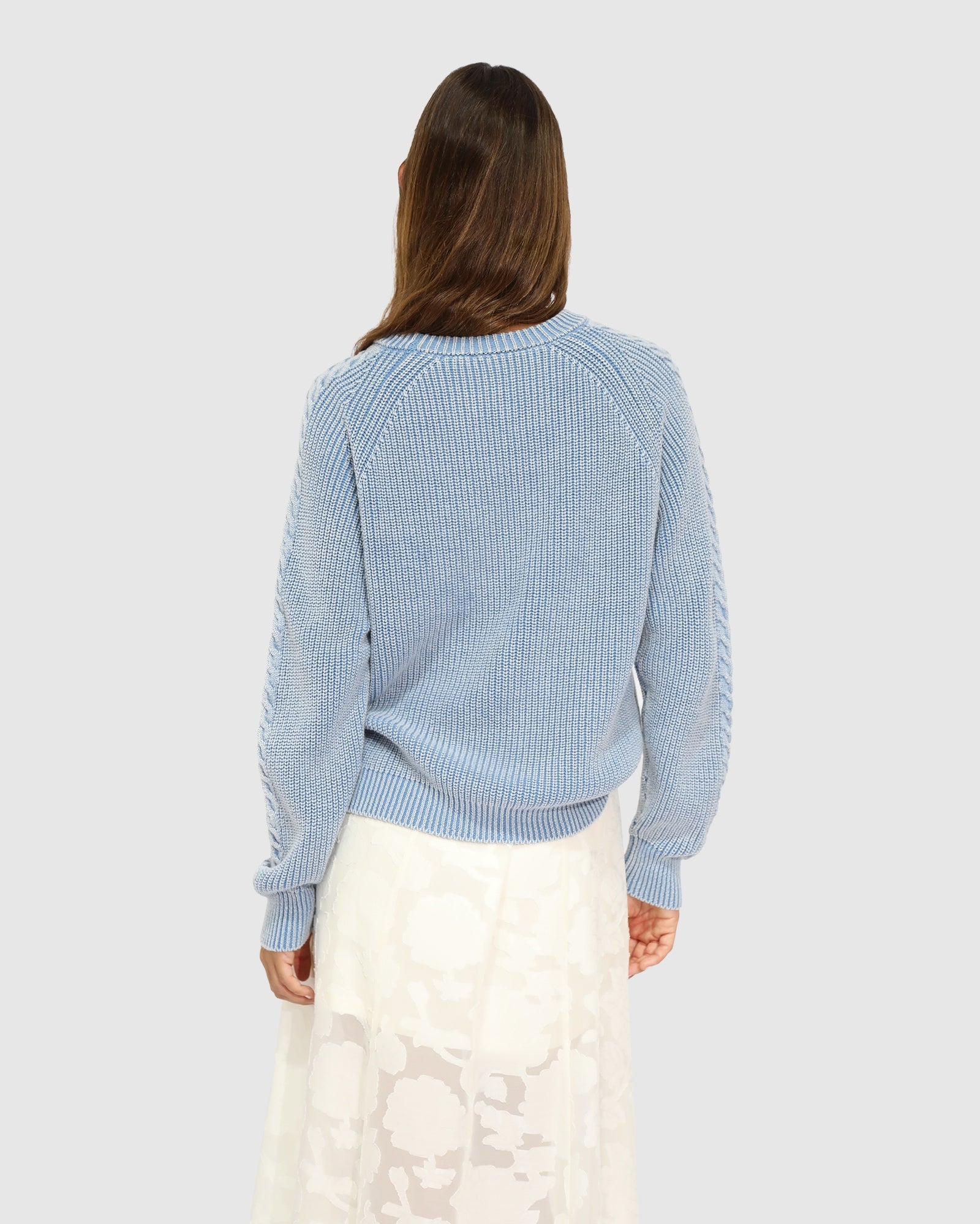 Cable knit sweater back view light blue
