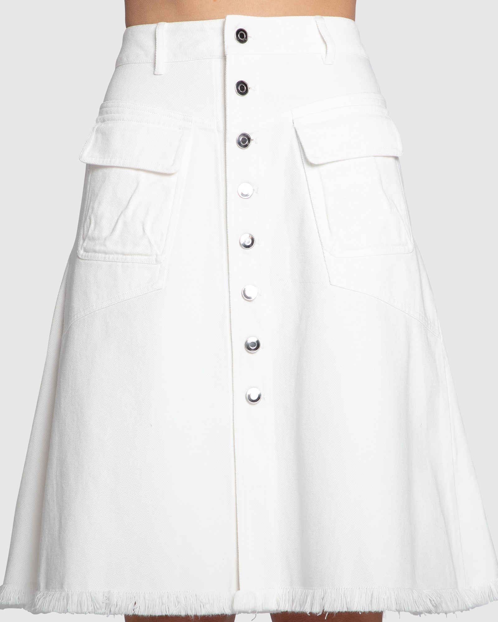 Close-up detail of button front on Belle and Bloom Let Me Wander off white denim midi skirt.
