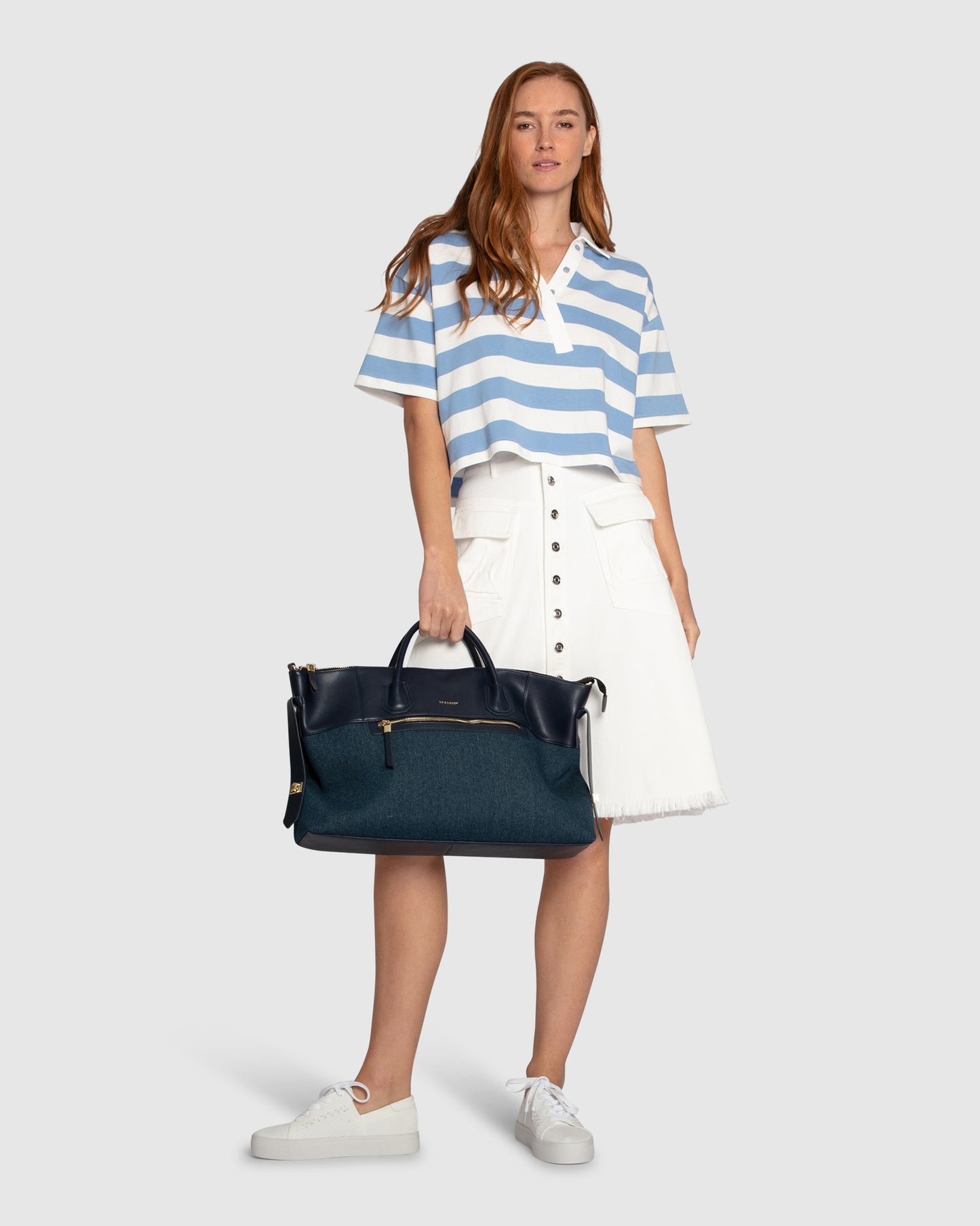 Belle and Bloom Let Me Wander button front denim midi skirt in off white, featuring raw hem and high waist.