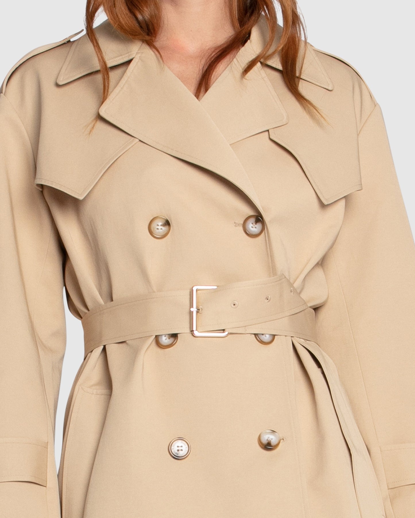 Close-up of the Whispers of Verona Trench Coat belt in light camel, featuring adjustable tie waist – Belle and Bloom detail shot.