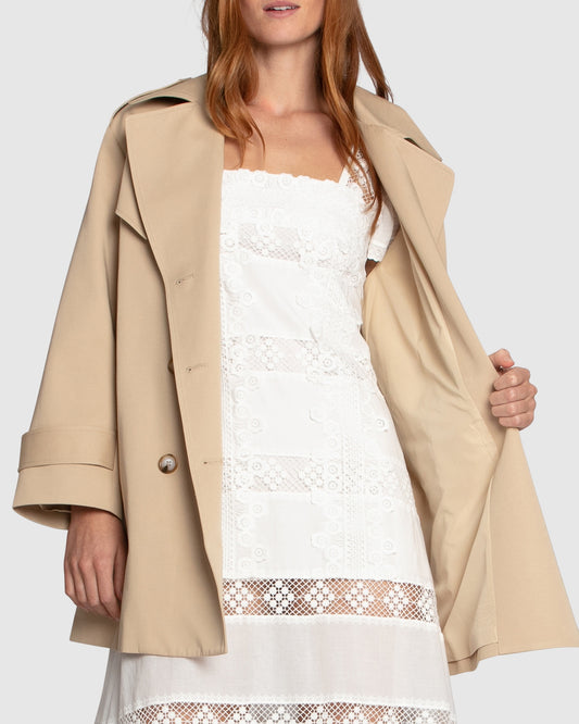 Interior view of the Whispers of Verona Trench Coat in light camel, featuring smooth inner lining, structured tailoring, and premium finish – Belle and Bloom women's outerwear.