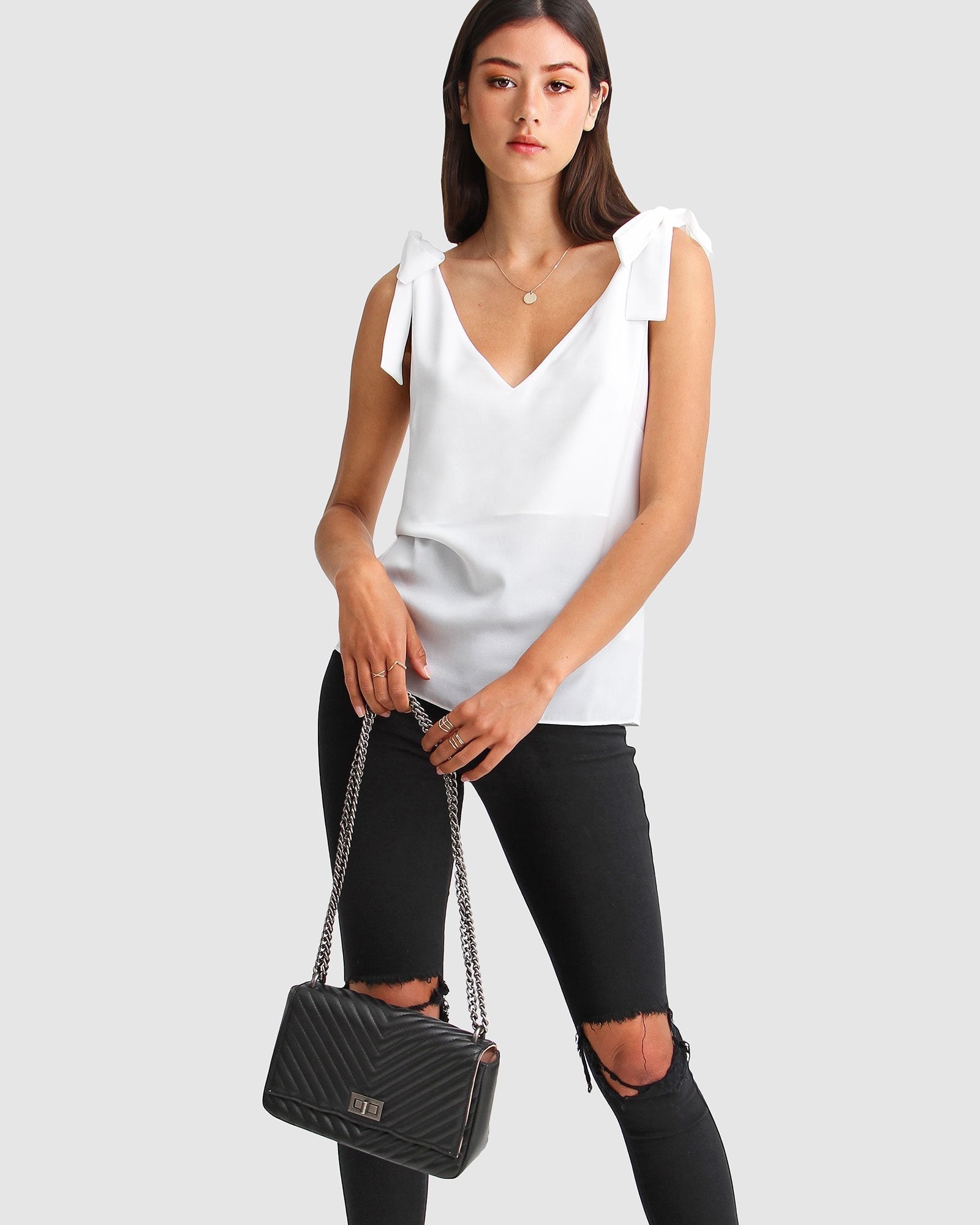 feel-for-you-white-v-neck-top-handbag_8e7cf414-e02e-429e-9856-d83020f94b28.jpg